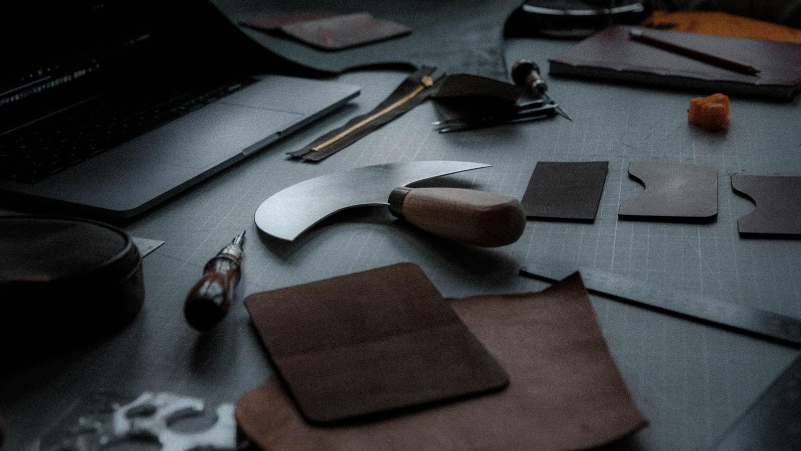 A saddler's bench — hand tools, waxed thread and cut leather